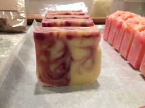 My first attempt at a hanger swirl. I colored too much of my soap, but I kinda like how it came out 50/50. This soap smells like a berry smoothie, thanks to the fragrance samples I got from Majestic Mountain Sage.